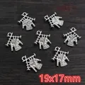 Macro view of 19x17mm antique silver alloy sweater charms for DIY jewelry making - Knitted Sweater Shape (E5-21)