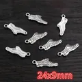 Macro detail of antique silver alloy sneaker charms for DIY jewelry making 24x9mm - Sneaker Shape (E5-22)