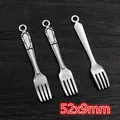 Macro view of vintage silver fork pendants sized 52x9mm for DIY jewelry making - Fork Style (AF2-25)