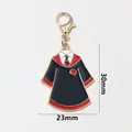Detail showing the 30mm x 23mm wizard school uniform pendant with lobster clasp - Wizard Robe Red Black Tie (SG-G4-08-AB1-02)