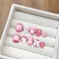 Set de 10 uñas postizas hechas a mano con diseños 3D de cerditos animados y lazos - XS