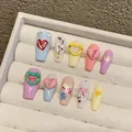 Handmade macaron colorful 3D press-on nails with heart and bow accents in 10 pieces set - Extra Small (XS) / Medium Trapezoid 1562