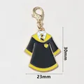 School uniform enamel charm pendant with golden lobster clasp and stripe tie detail - Wizard Robe Yellow Black Tie (SG-E2-51-AB1-02)