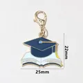 Blue enamel graduation cap and book pendant with lobster clasp, 25mm x 22mm size - Blue Graduation Cap (SG-C6-54-AB1-02)