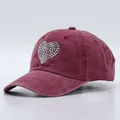 Detailed close-up of dark red washed cotton baseball cap with rhinestone heart patch - Adjustable / Rhinestone Heart Style / Burgundy