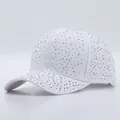White baseball cap with colorful rhinestones on a clean grey background with reflection - Adjustable / White