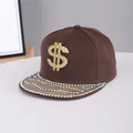Detail of flat brim baseball cap with gold rhinestone dollar sign and studded visor - Adjustable / Currency-Coffee