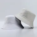 Detail of minimalist bucket hats showing fine grid texture and stitched brim in neutral tones - One Size / White And Beige