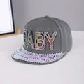 Detailed view of colorful rhinestones on a grey snapback hat with laser holographic brim - Adjustable / Letter Style Grey