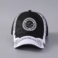 Close-up of black and white baseball cap with detailed Washington DC circular embroidery - Adjustable / Washington DC City Style / Black + White