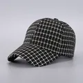 Detailed close-up of houndstooth tweed baseball cap showing woven texture and frayed brim - Black and White Plaid Weave / Black and White Houndstooth (1#)