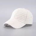 Close-up of cream baseball cap featuring fine checkered tweed fabric and premium texture - Cream Small Grid / Beige Grid (2#)