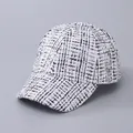 Macro detail of high-quality black and white houndstooth tweed texture on a baseball cap - Adjustable / White Sequin Tweed Style