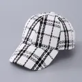 Close-up of black and white houndstooth pattern and tweed texture on baseball cap - Adjustable / White Houndstooth