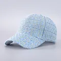 Detailed view of light blue tweed baseball cap with metallic gold thread texture - Light Blue Gold Tweed (18#)