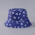 Detail view of navy blue bucket hat featuring white skull print and BOO text for Halloween - Blue White Skull Hand Print (20#)