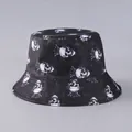 Close-up of skull and crown print detail on black reversible cotton fisherman hat - Black Skull Crown Print (21#)