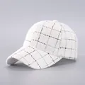 Close-up of premium tweed baseball cap with black and gold plaid texture detail - White Black Gold Grid (11#)