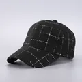 Macro detail of houndstooth baseball cap in black tweed with gold and silver metallic threads - Black Gold Silver Grid (12#)