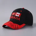 Close-up of 3D I Love Canada embroidery and flag on black baseball cap brim - Adjustable / Black With Red Brim I Love Canada
