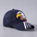 Detailed close-up of eagle embroidery and US flag stars pattern on the baseball cap - Navy Blue Eagle Head