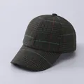Detailed close-up showing the wool blend houndstooth texture of the striped baseball cap - Adjustable / Dark Green Fine Stripe