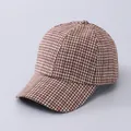 Close-up macro view of the textured houndstooth fabric pattern on the brown baseball cap - Adjustable / Coffee Fine Stripe