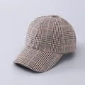 Detailed top view of a classic striped baseball cap with plaid pattern and stitched seams - Adjustable / Khaki Fine Stripe