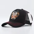 Black mesh trucker hat featuring detailed wolf embroidery and red contrast stitching - Lion Solid Black