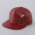 Detail of dark red faux leather baseball cap showing embossed snakeskin texture and flat brim - Plain Style / Wine Red