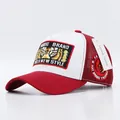 Red and white trucker hat featuring a detailed tiger embroidery and mesh back panel - Tiger Eyes White Red Brim