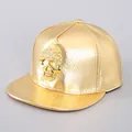 Gold snakeskin faux leather snapback cap with crystal studded skull metal decor - Gold Skull