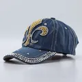 Blue denim baseball cap with gold and silver rhinestone flower and studded brim - Fleur-de-lis Medium Blue