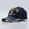 Dark blue denim baseball cap with fleur-de-lis rhinestone pattern and studded brim - Fleur-de-lis Dark Blue