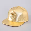 Detail of gold PU baseball cap with faux snake texture and iced out dollar sign - Gold Money Sign