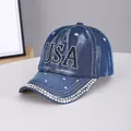 Blue washed denim baseball cap with USA rhinestone lettering and sparkling brim accents - USA Medium Blue