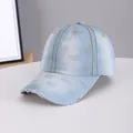 Light blue denim baseball cap with rhinestone MIU lettering and distressed brim - Logo Light Blue
