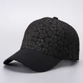 Elegant black floral baseball cap with textured pattern and curved brim for women - Black Small Floral