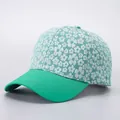 Floral print baseball cap with light blue flower pattern and green curved brim visor - Green Small Floral