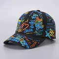 Detail of hip hop baseball cap with colorful graffiti print and motivational quotes - Black-B52