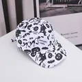 Detail of white baseball cap with black Halloween pumpkin and bat prints on clean background - Adjustable / White Bat
