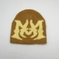 Close-up of brown faux mink knit beanie featuring soft plush texture and yellow letter M - One Size / Brown Large M