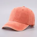 Adjustable washed cotton baseball cap in vibrant coral orange with a classic soft top design - Adjustable / Pure Cotton Soft Top - Orange