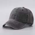 Detail view of washed cotton baseball cap showing vintage gray fabric and six-panel stitching - Adjustable / Pure Cotton Soft Top - Black