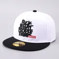 Flat brim snapback hat in white and black with embroidered slogan for streetwear style - Adjustable / White Black Contrast Slogan