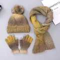 Detailed view of yellow tie-dye knit hat, scarf, and touchscreen gloves with faux fur pom - Ginger Gradient