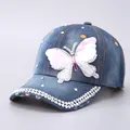 Detailed view of denim baseball cap with butterfly sequin patch and crystal rhinestones - Denim Blue Scale Pink Butterfly