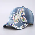 Washed denim baseball cap with colorful rhinestone butterfly and studded curved brim - Denim Blue Fashion Colorful Rhinestone Butterfly