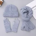 Detail of light blue knit winter set including touch screen gloves, scarf and warm hat - Regular Hat / Light Blue