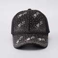 Detail of silver rhinestones forming Love pattern on black cotton baseball cap - Adjustable / Black - Small Rhinestone LOVE